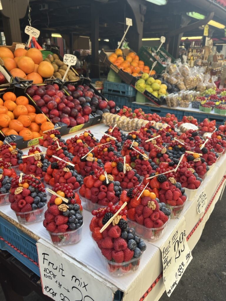 Fresh seasonal produce at a local market in Prague, illustrating how travel influences cooking by inspiring seasonal shopping habits.
