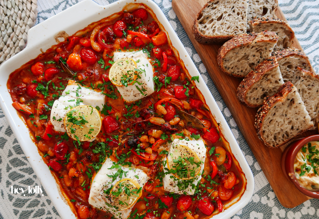 Baked cod with chorizo in a lemony tomato and pepper stew.