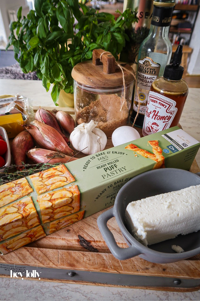 Overhead shot of ingredients for a golden shallot and tomato tart