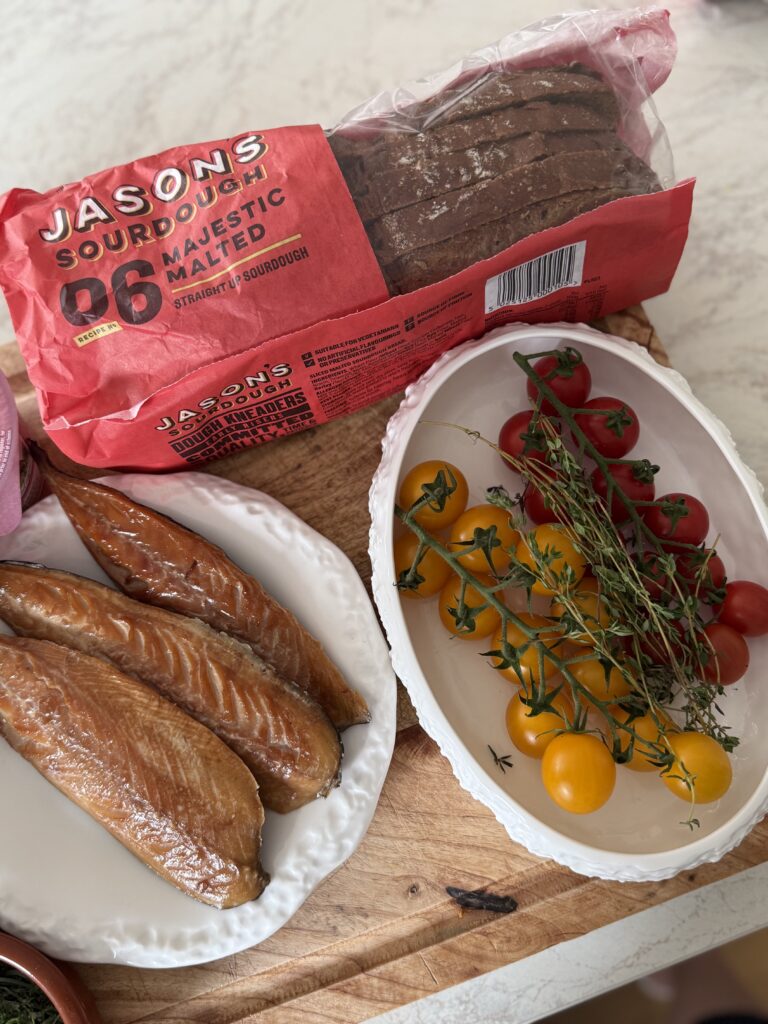 Fresh ingredients for flexitarian breakfast plate: Jason’s sourdough, eggs, dill, capers, and cherry tomatoes.