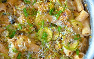 overhead shot of courgette lemon ricotta rigatoni pasta