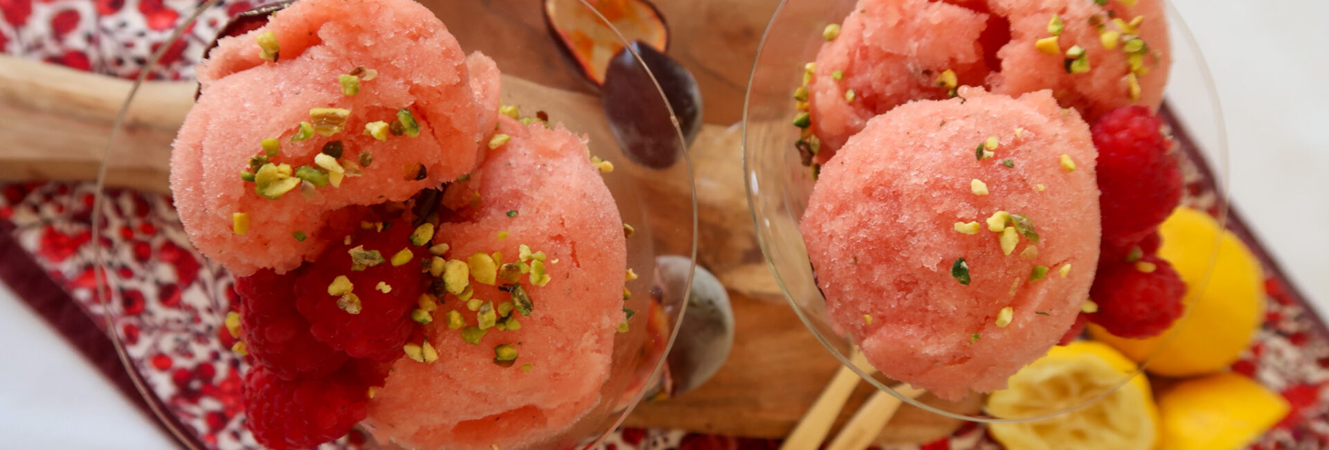 Close-up of no-churn nectarine and passion fruit sorbet, served with passion fruit pulp