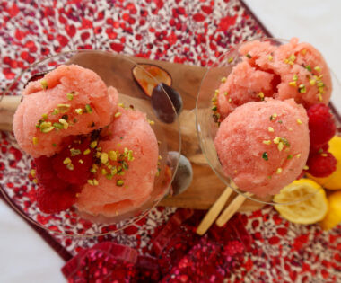 Close-up of no-churn nectarine and passion fruit sorbet, served with passion fruit pulp