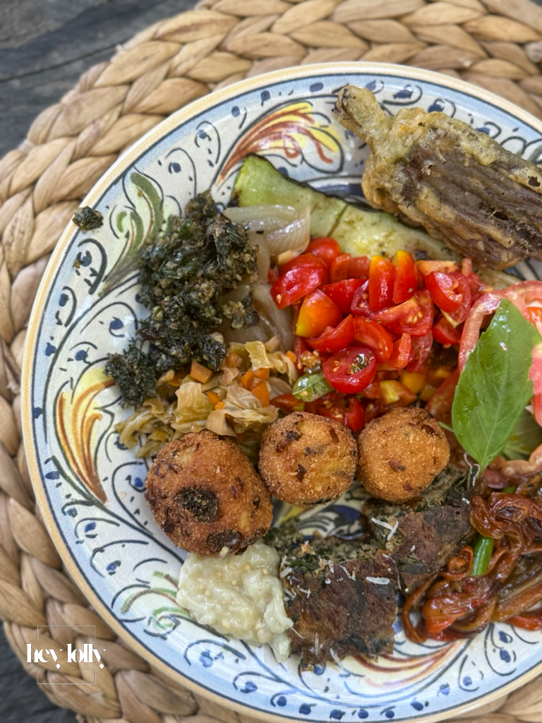Mixed platter of homemade Sicilian food prepared during a garden-to-table cooking class in Siracusa.