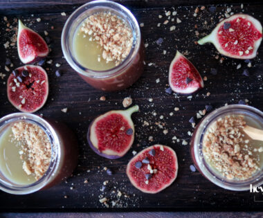 Salted Caramel Chocolate Pots served in small glasses, topped with glossy caramel and sea salt flakes.
