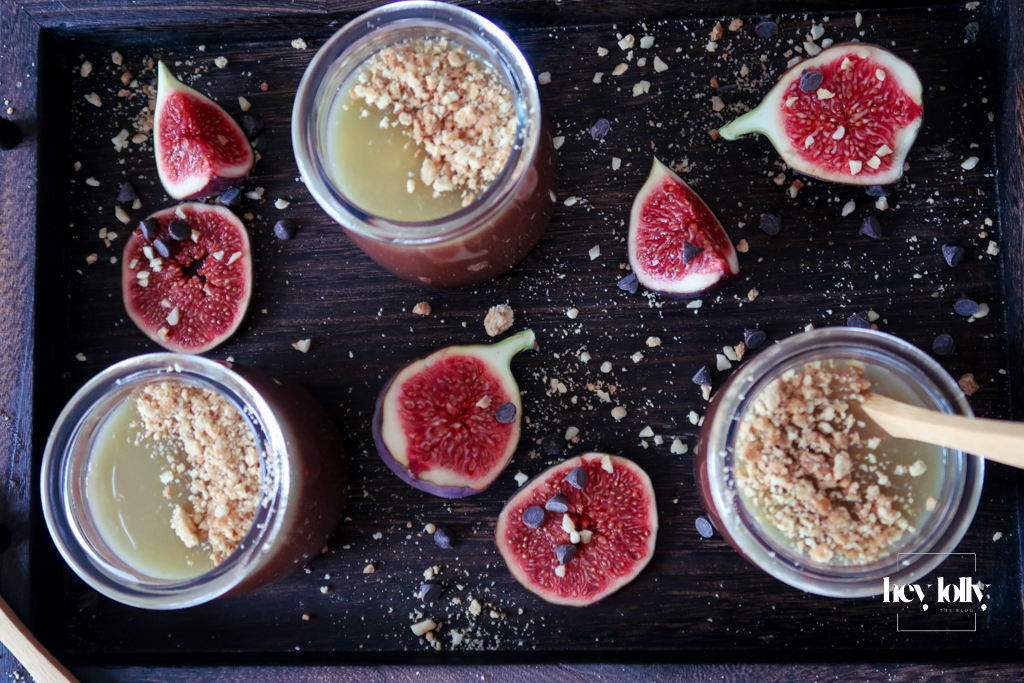 Salted Caramel Chocolate Pots served in small glasses, topped with glossy caramel and sea salt flakes.