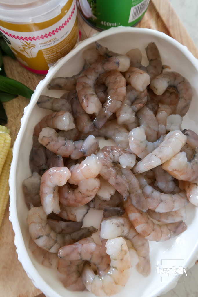 Close-up of raw king prawns prepared for Thai Red King Prawn curry.