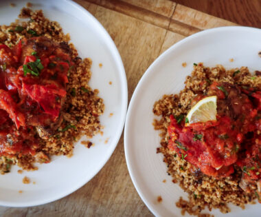 uicy Za’atar Chicken Thighs with golden skin and roasted tomato anchovy topping”
