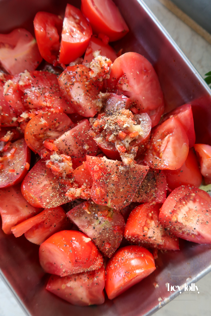 Za’atar Chicken Thighs tomatoes seasoning ingredients — olive oil, cumin, za’atar, garlic, chilli