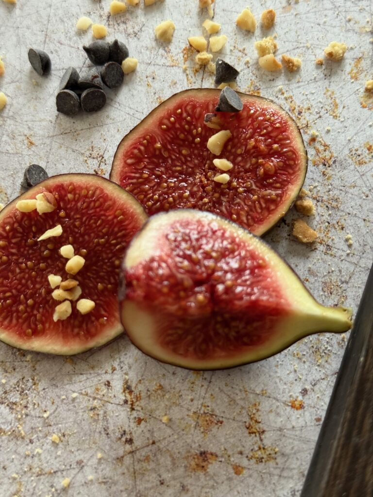 Chopped fresh fig on a board ready for upside-down cakes