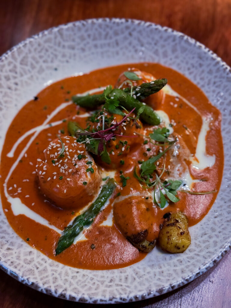Malai Chicken at Passan’s Nottingham — creamy spiced sauce with roasted potatoes and asparagus.