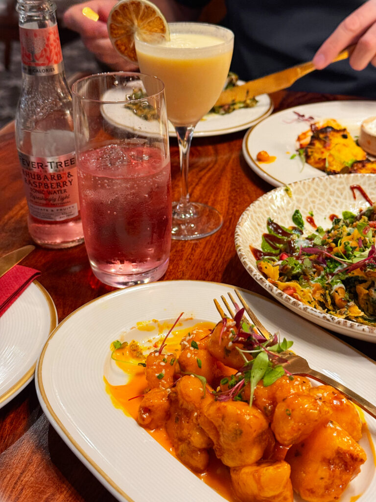 Selection of Indian mains at Passan’s Nottingham photographed overhead on a candlelit table.