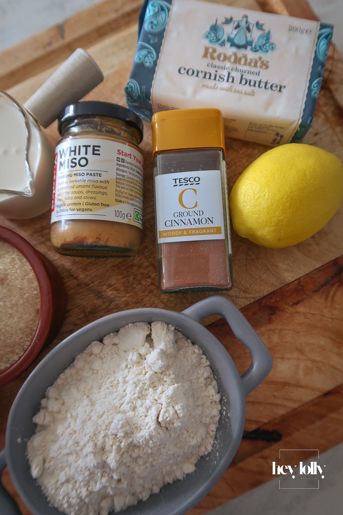 Gala apples, butter, sugars, white miso, flour, cream, and cinnamon arranged for apple and miso caramel crumble.