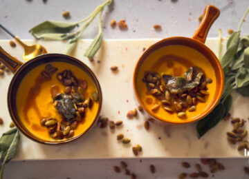 Bowls of Butternut Squash Soup with Sage Brown Butter, crisp sage and toasted pumpkin seeds