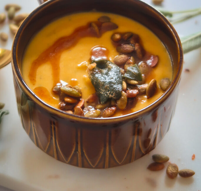 overhead shot of butternut squash with sage brown butter and toasted pumpkin seeds