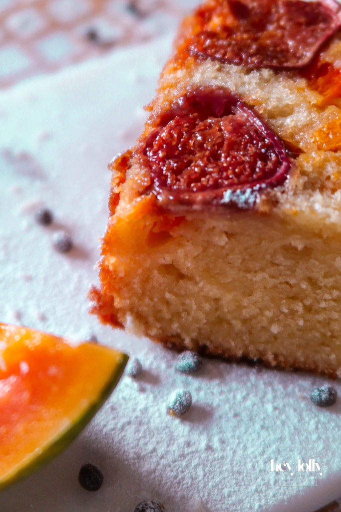 Olive-oil cake crumb, soft and tender, topped with jammy fig and papaya