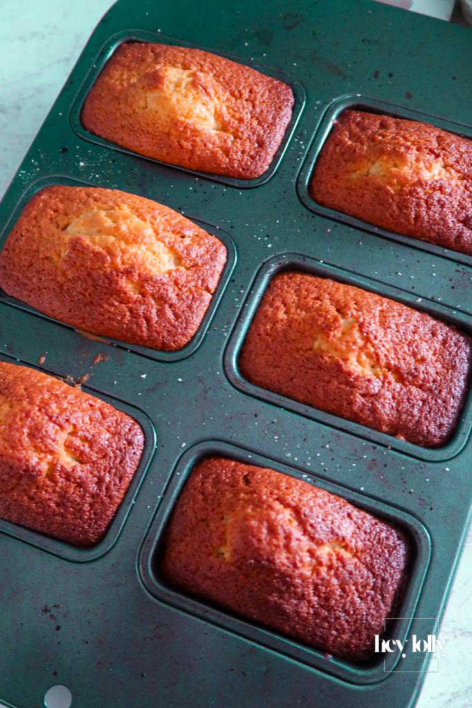 Caramelised fig slice set into a glossy papaya top on a mini upside-down cake