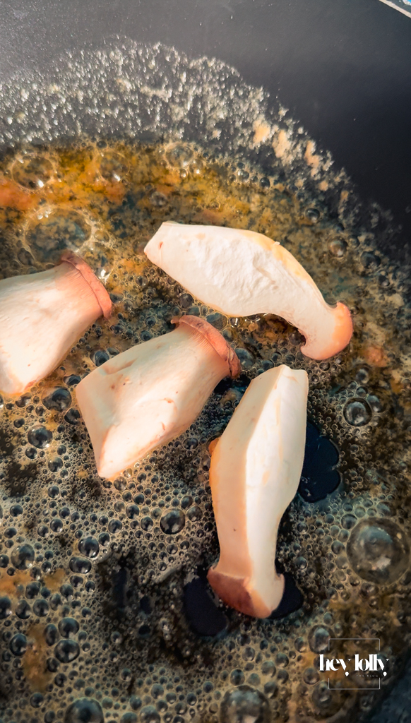 Mushrooms deeply caramelised to a rich bronze with scattered thyme leaves.