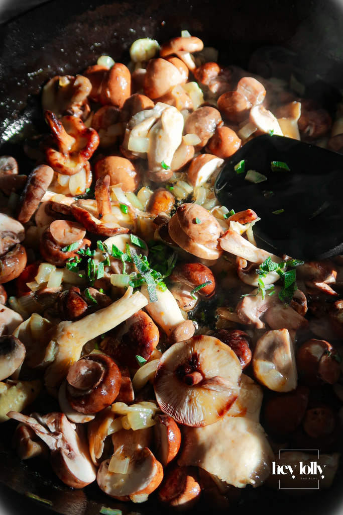Mushrooms deeply caramelised to a rich bronze with scattered thyme leaves.