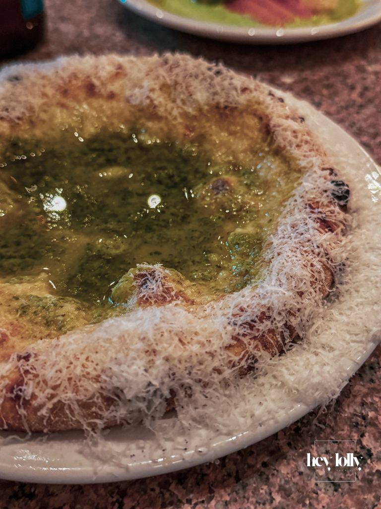 Garlic-butter pizette with lacy Parmesan fringe at Pici – Pici Nottingham review