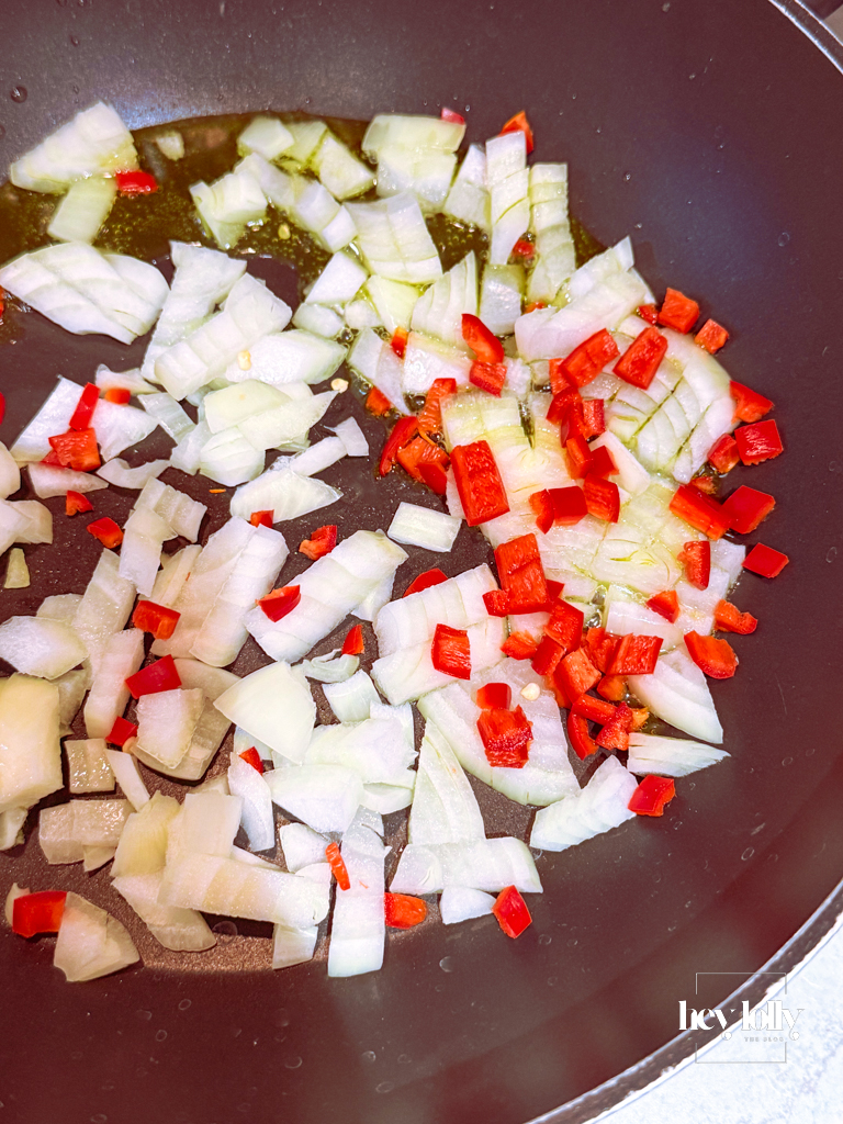 Onion, garlic, red pepper and tomato purée ready for the Sloppy Joe topping.