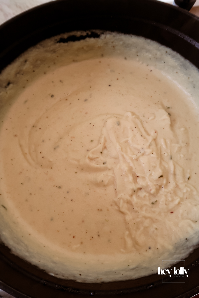 Blending the soup until silky smooth.