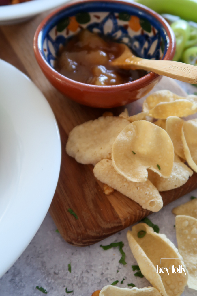 crisp poppadums and a side of mango chutney