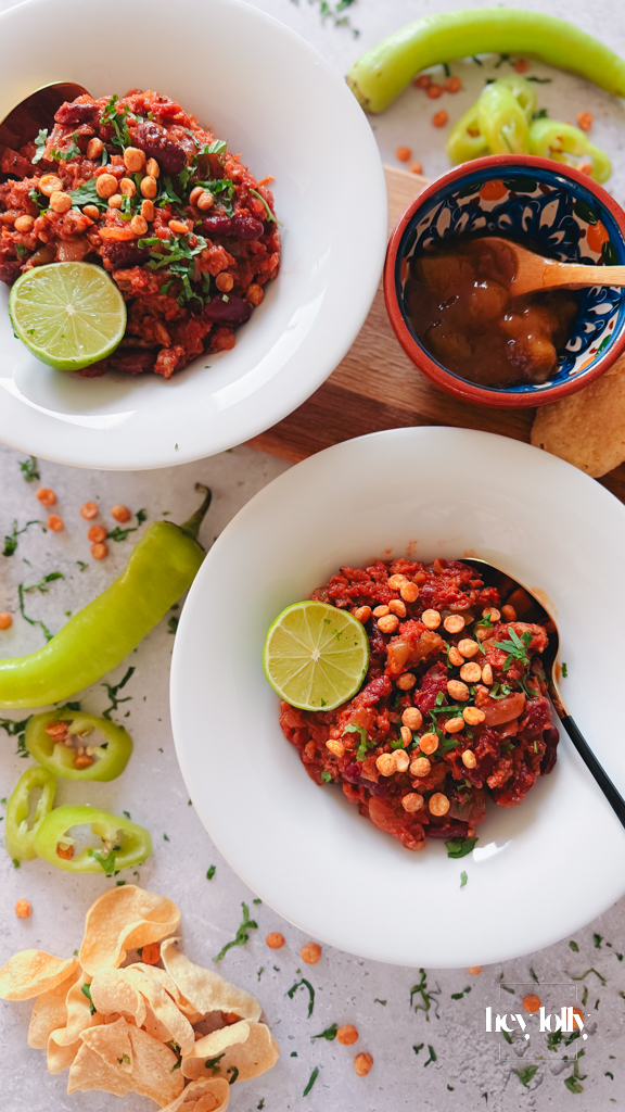 overhead shot of loaded bowls filled with chicken and kidney bean keema