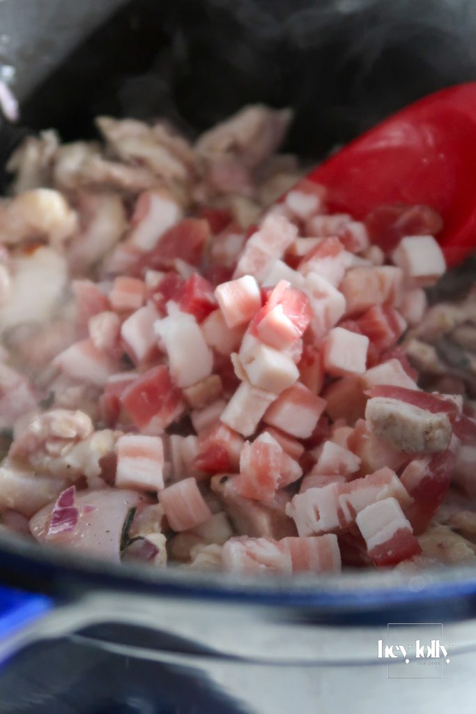 Bowls of diced pancetta, chicken thigh chunks, and frozen peas