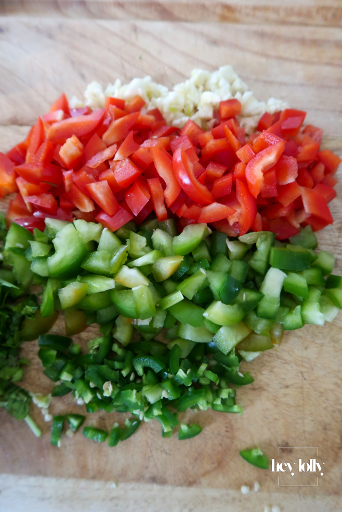chopped garlic, peppers and jalapeno for cownboy taco soup