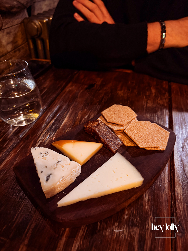 spanish cheese selection with fig jelly at plates by purnell's