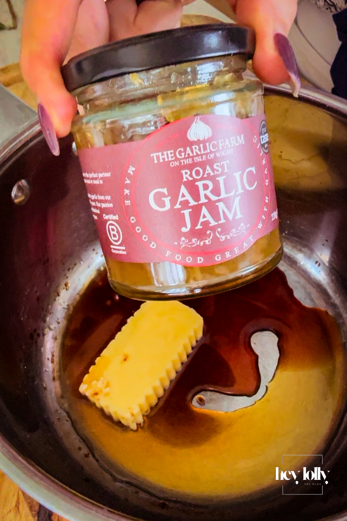 Making the garlic glaze for the pork and stuffing roast bombs.