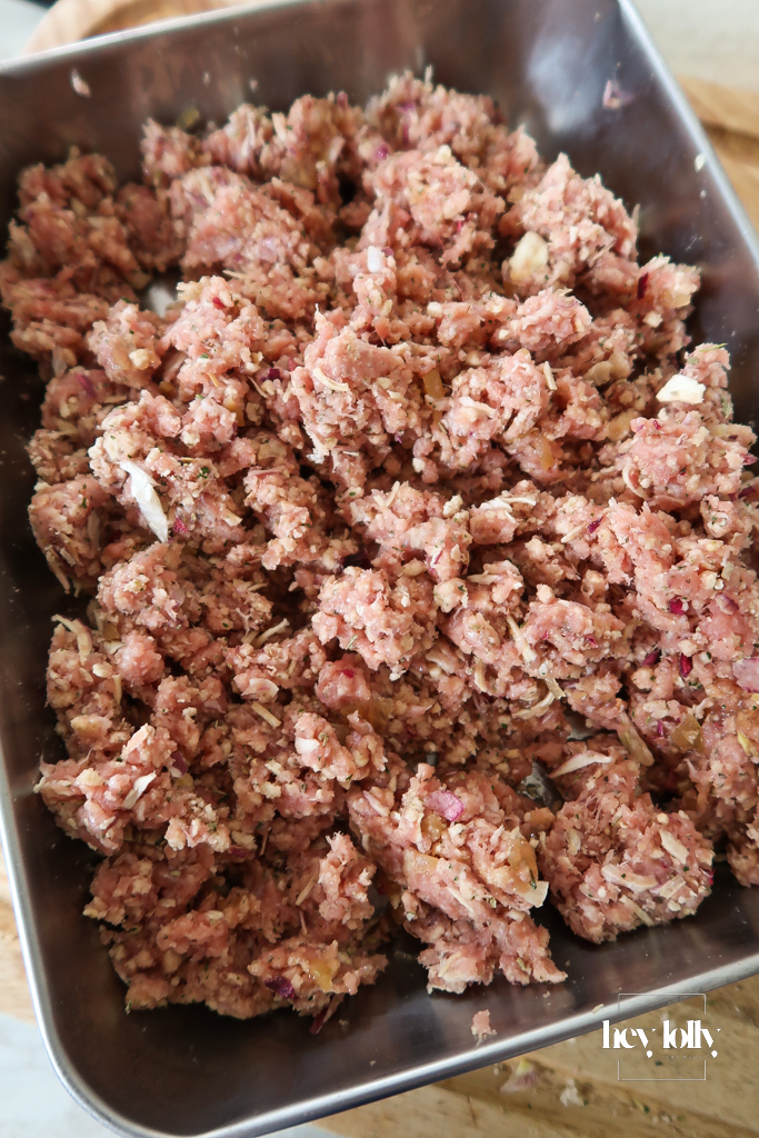 Ingredients for pork and stuffing roast bombs with roast garlic jam and fennel seeds.