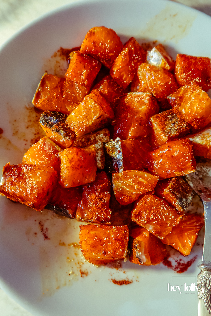 Skinless salmon fillets, courgettes, halloumi, lemon, tahini, garlic, honey, olive oil and spices laid out for skewers.
