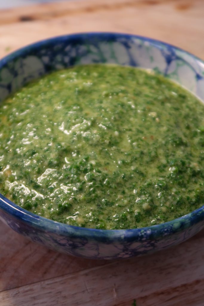 Kale pesto in a small bowl ready for serving