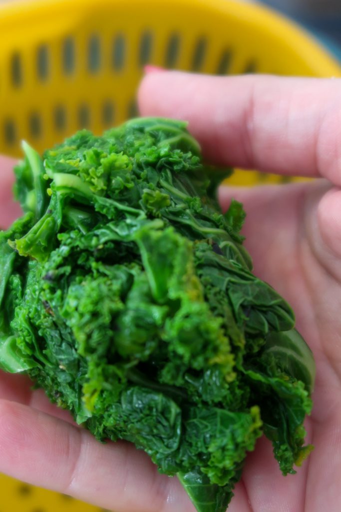 Kale being blanched for pesto