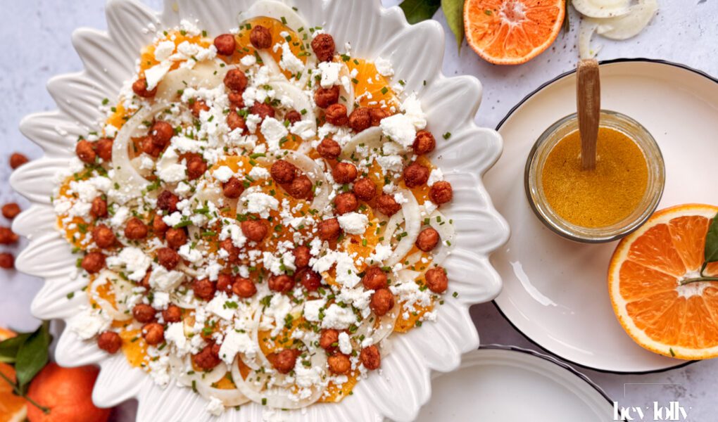 overhead shot of orange, fennal and crispy chickpea salad with feta