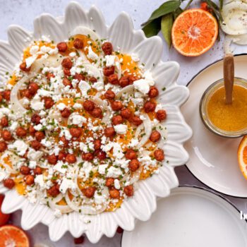 overhead shot of orange, fennal and crispy chickpea salad with feta