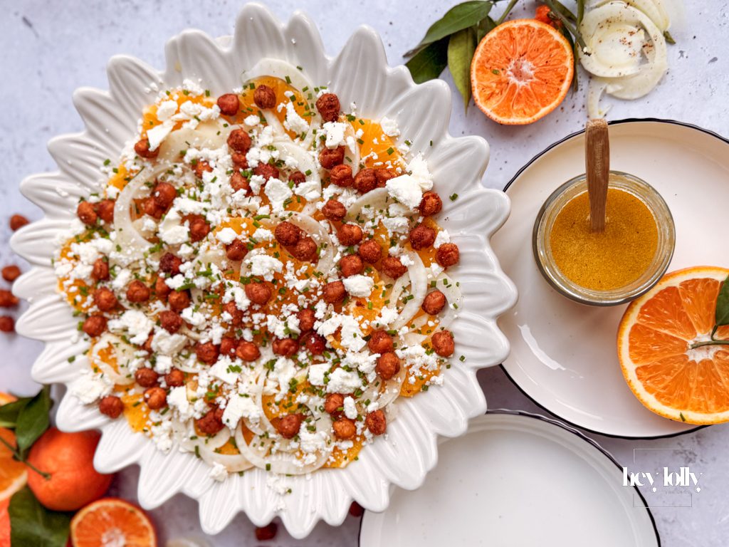 overhead shot of orange, fennal and crispy chickpea salad with feta