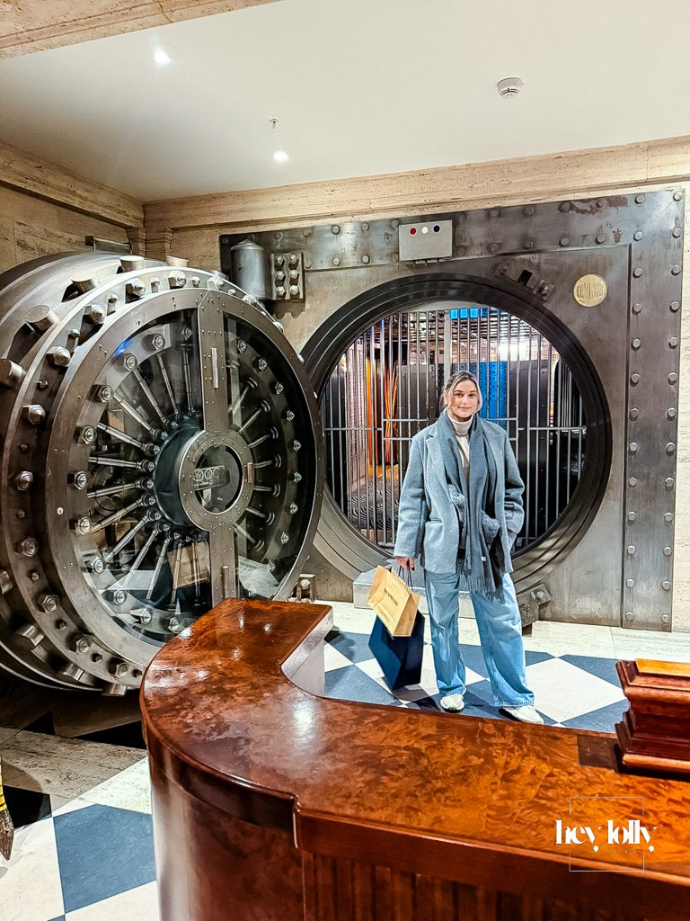 Guest pictured outside the Vault Bar at The Ned London