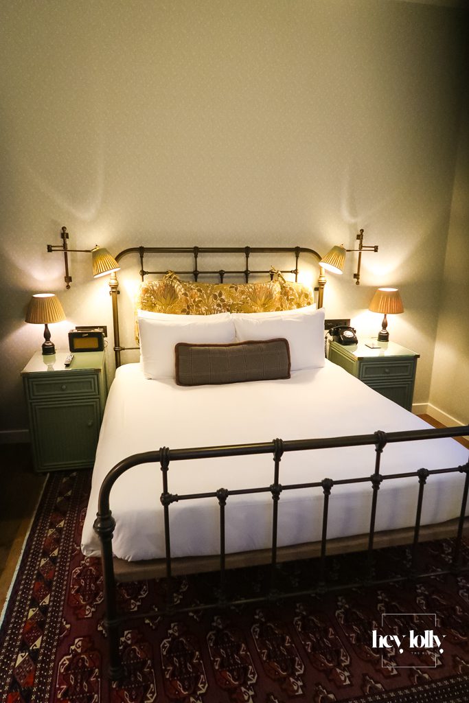 Cosy room interior at The Ned London with soft lighting