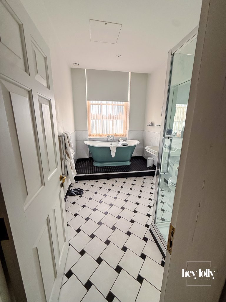 Luxury bathroom at Buxton Crescent Spa Hotel featuring deep soaking bathtub