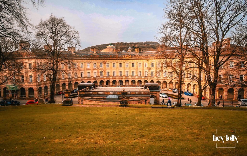 Historic colonnade and stone architecture of Buxton Crescent in the Peak District