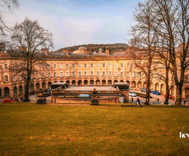 Historic colonnade and stone architecture of Buxton Crescent in the Peak District