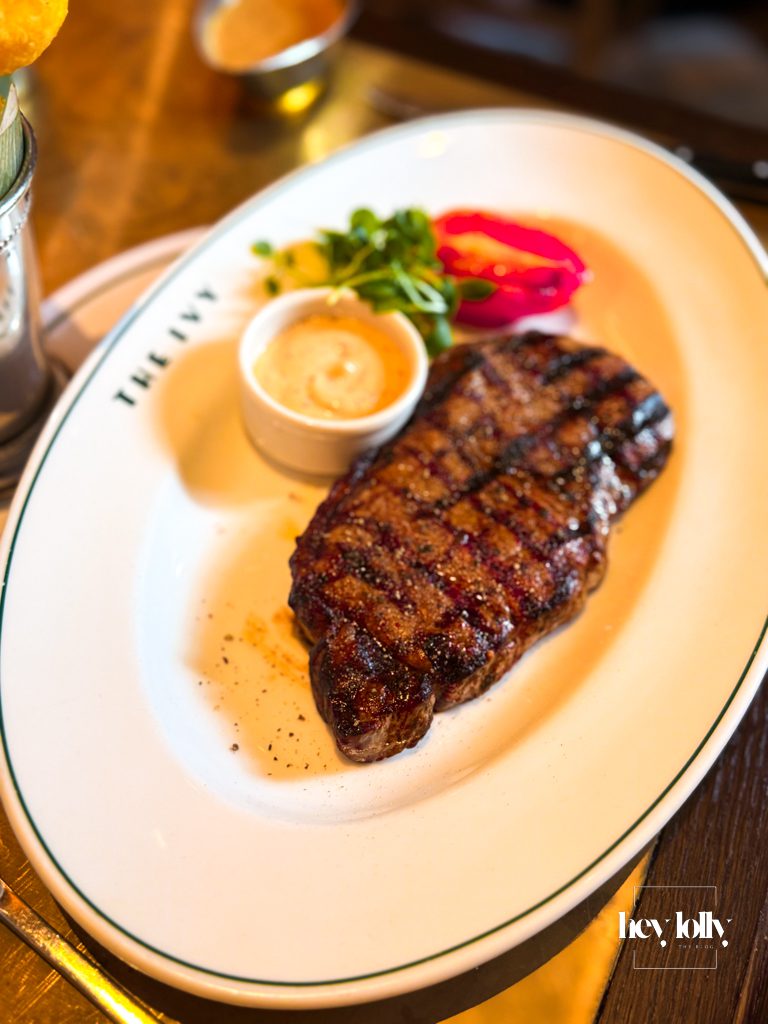 Grilled sirloin steak with peppercorn sauce and roasted tomato at The Ivy Nottingham