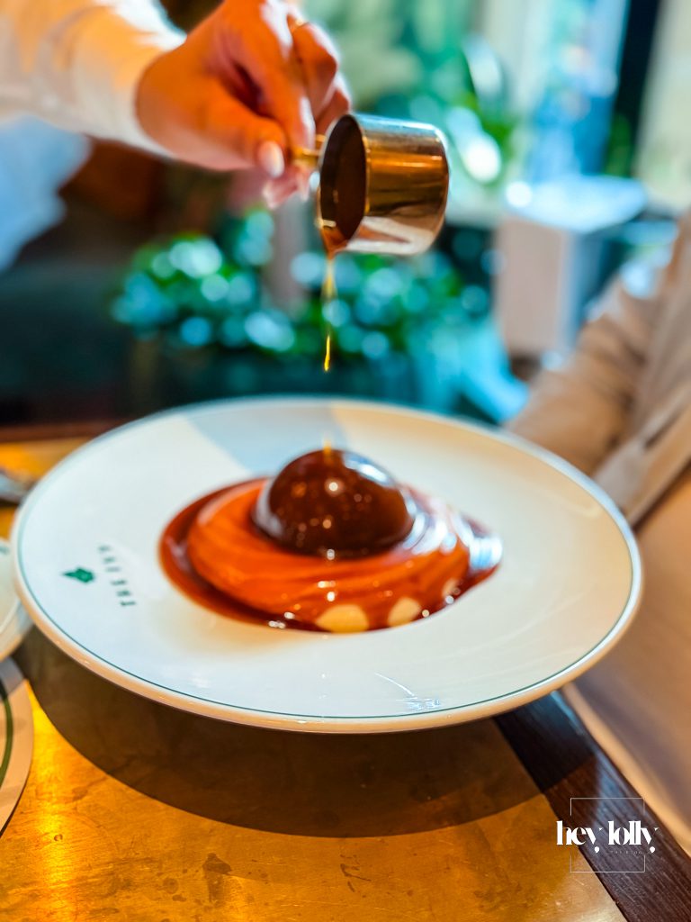 The Ivy chocolate bombe dessert served at The Ivy Nottingham restaurant