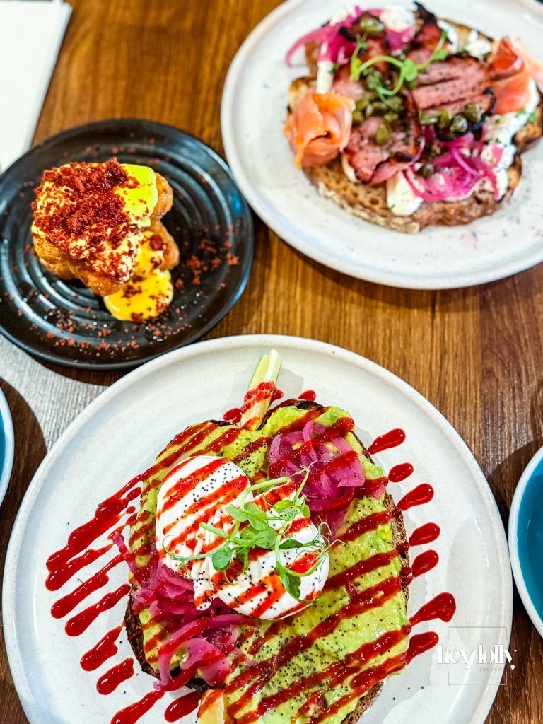 Colourful brunch spread at Bistro 66 in Beeston with eggs, smoked salmon toast, hash browns, coffee and smoothie
