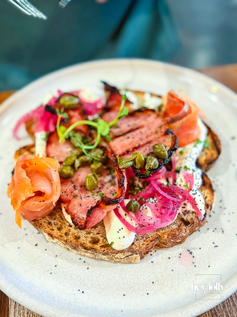 Labneh and smoked salmon on toast with capers, pickled onions and grilled bacon at Bistro 66 Beeston