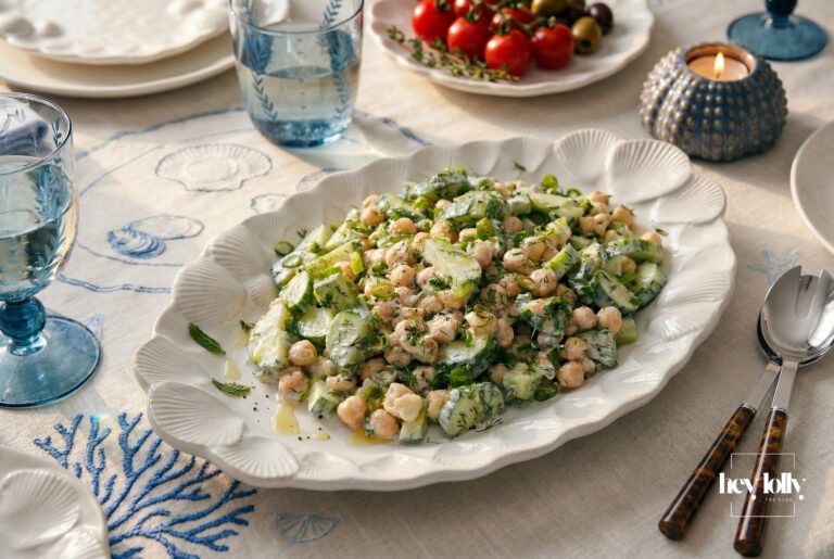 Summer tzatziki chickpea bowl with cucumber, herbs and yogurt dressing served fresh